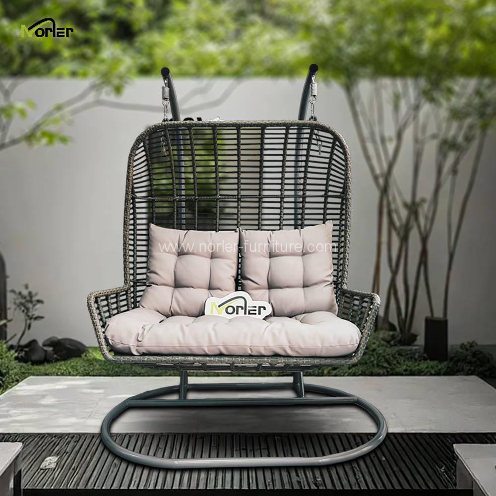Does a PE Rattan Hanging Swing Chair Come with a Comfortable Cushion for Back Support